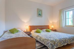 Postel nebo postele na pokoji v ubytování Holiday home Paradise + 42 fotografií