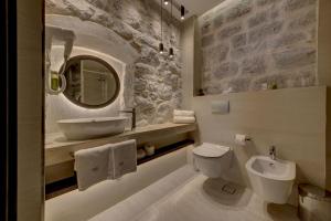Koupelna v ubytování Heritage Hotel Leon Coronato