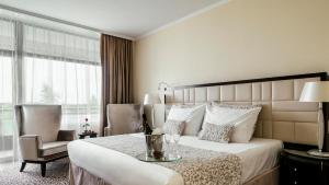 Postel nebo postele na pokoji v ubytování Baltic Beach Hotel & SPA