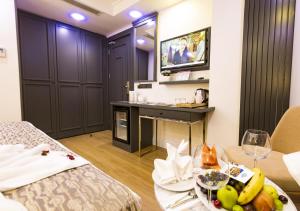 Postel nebo postele na pokoji v ubytování Antusa Design Hotel & Spa
