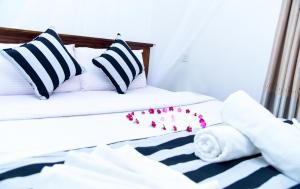 Cama o camas de una habitación en Gems Moon Paradise