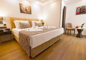 Postel nebo postele na pokoji v ubytování Antusa Design Hotel & Spa