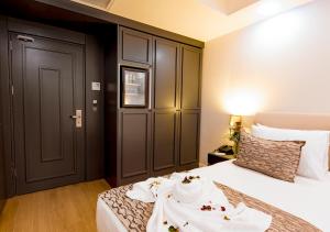 Postel nebo postele na pokoji v ubytování Antusa Design Hotel & Spa