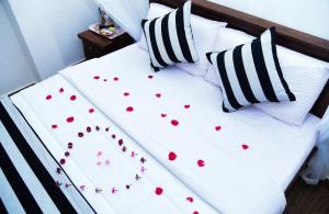 Cama o camas de una habitación en Gems Moon Paradise