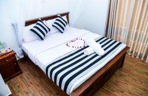 Cama o camas de una habitación en Gems Moon Paradise