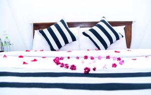 Cama o camas de una habitación en Gems Moon Paradise
