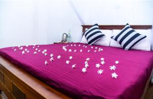 Cama o camas de una habitación en Gems Moon Paradise