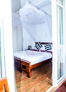 Cama o camas de una habitación en Gems Moon Paradise