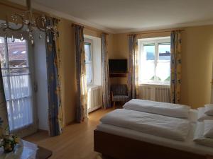 Letto o letti in una camera di Hotel - Garni Stabauer