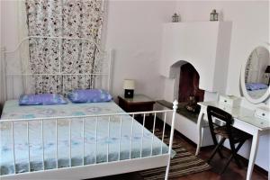 A bed or beds in a room at Nymph
