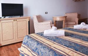 Postel nebo postele na pokoji v ubytování Hotel Villa Strassoldo "Ex Attianese Hotel Restaurant"