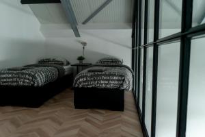 Postel nebo postele na pokoji v ubytování Huis van Harderwijk