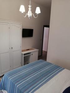 Postel nebo postele na pokoji v ubytování B&B Notte d'autore