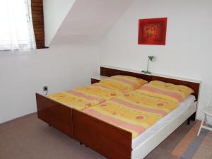 Postel nebo postele na pokoji v ubytování Apartma Šťastný II + 10 fotografií
