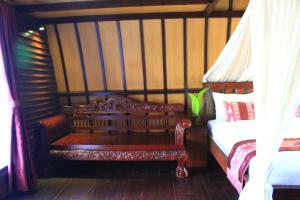 Letto o letti in una camera di Turtle Beach Hotel