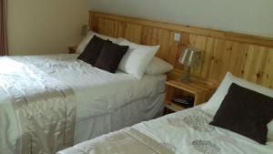 Tempat tidur dalam kamar di Ashfield B&B