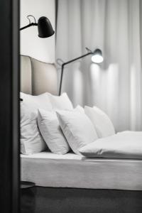 Cama o camas de una habitación en Pytloun Flat Hotel
