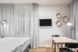 Cama o camas de una habitación en Pytloun Flat Hotel