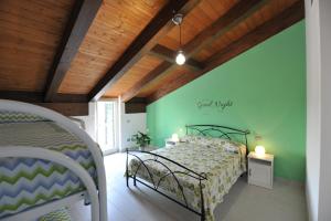 A bed or beds in a room at B&B Cascina Fiorita