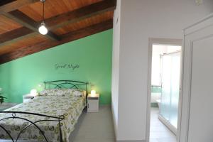 A bed or beds in a room at B&B Cascina Fiorita