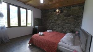 Postel nebo postele na pokoji v ubytování Peak Mazeri Guest House