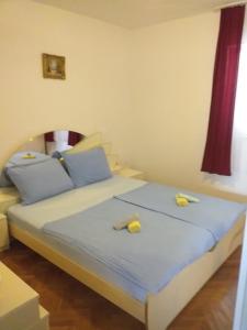 Postel nebo postele na pokoji v ubytování Apartment Onix
