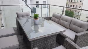 Posedenie v ubytovaní Loft #11 mit großer Loggia und Terrasse
