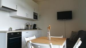 Kuchyňa alebo kuchynka v ubytovaní apartmán Pod Lapkou
