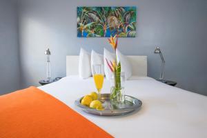 Postel nebo postele na pokoji v ubytování Hollywood Beach Suites and Hotel