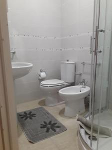 A bathroom at Rosa Holiday Home Még 19 kép