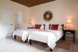 Postelja oz. postelje v sobi nastanitve White Sands Negril