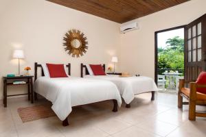Postelja oz. postelje v sobi nastanitve White Sands Negril
