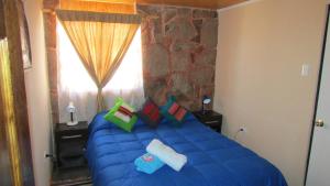 Postel nebo postele na pokoji v ubytování Hostal Desert