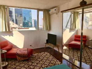 Bright, open view studio in Retiro的休息区