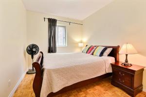 Posteľ alebo postele v izbe v ubytovaní APARTMENT HOTEL ST-DENIS