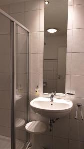 Koupelna v ubytování Attika Ferienwohnung Merk + 20 fotografií