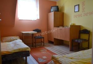 Posteľ alebo postele v izbe v ubytovaní siodemka