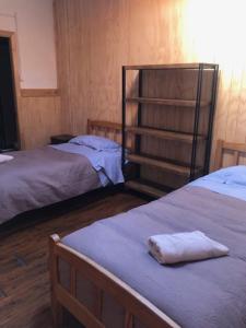 Ένα ή περισσότερα κρεβάτια σε δωμάτιο στο El Sendero