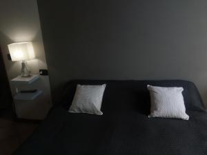 Posteľ alebo postele v izbe v ubytovaní Appartamento Luisa