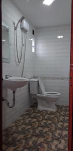 a bathroom with a toilet and a sink at Lucky 190 in Chau Doc +44 photos