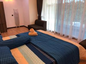 Postel nebo postele na pokoji v ubytování Home Suhaila