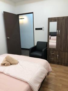 Postel nebo postele na pokoji v ubytování Home Suhaila
