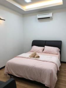 Postel nebo postele na pokoji v ubytování Home Suhaila