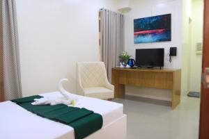 TV o dispositivi per l'intrattenimento presso RNR Suites