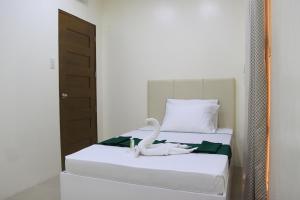 Letto o letti in una camera di RNR Suites