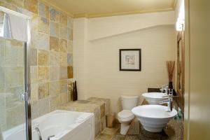 
A bathroom at Prestige Beach House; BW Premier Collection
