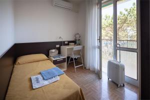 Postel nebo postele na pokoji v ubytování Hotel Aspe