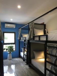 Postel nebo postele na pokoji v ubytování LANGCHIA HOME