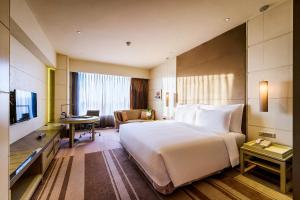 Voodi või voodid majutusasutuse Hotel Nikko Saigon toas