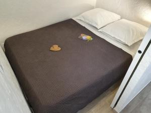Кровать или кровати в номере T2 rez de jardin front de mer